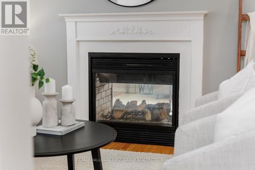 30 Mccorkell Street, Clarington, ON - Indoor Photo Showing Living Room With Fireplace