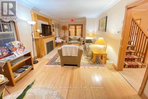 6257 Dunn Street, Niagara Falls, ON - Indoor Photo Showing Living Room With Fireplace