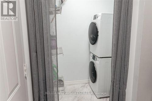 203 - 75 Huxley Street, London, ON - Indoor Photo Showing Laundry Room