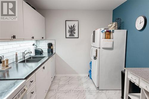 203 - 75 Huxley Street, London, ON - Indoor Photo Showing Kitchen With Double Sink