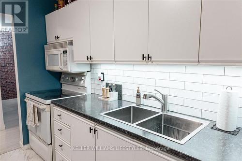 203 - 75 Huxley Street, London, ON - Indoor Photo Showing Kitchen With Double Sink