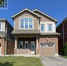 435 Etheridge Avenue, Milton (Ford), ON  - Outdoor With Facade 