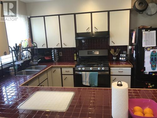 45 Carrier Crescent, Fraser Lake, BC - Indoor Photo Showing Kitchen With Double Sink