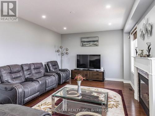 24 Bonnieglen Farm Boulevard, Caledon, ON - Indoor Photo Showing Living Room With Fireplace