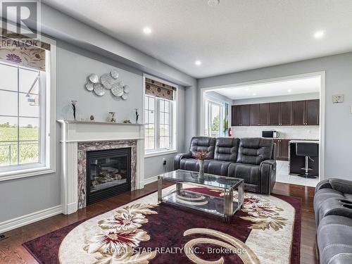 24 Bonnieglen Farm Boulevard, Caledon, ON - Indoor Photo Showing Living Room With Fireplace