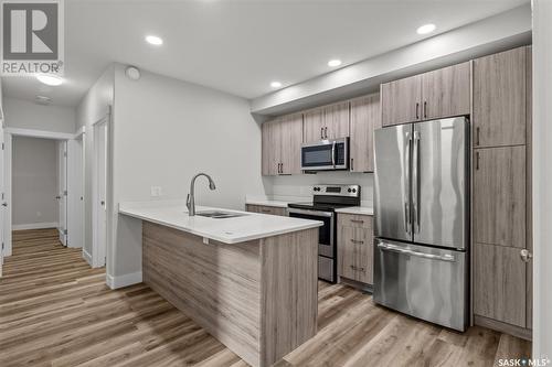 3003/3009 5A Avenue E, Prince Albert, SK - Indoor Photo Showing Kitchen With Stainless Steel Kitchen