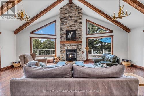 22 Towes Lane, Bancroft, ON - Indoor Photo Showing Living Room With Fireplace