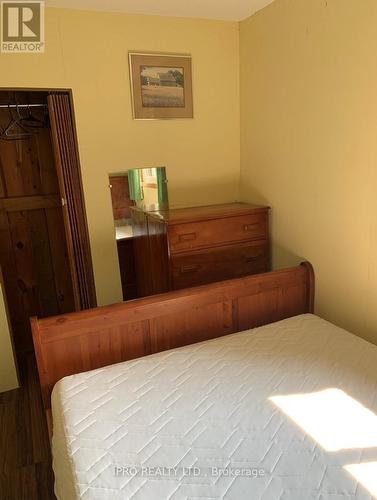 27 Balmoral Avenue, Tiny, ON - Indoor Photo Showing Bedroom