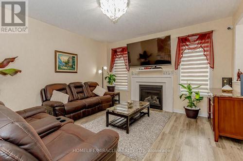 124 Casserley Crescent, New Tecumseth, ON - Indoor Photo Showing Living Room With Fireplace