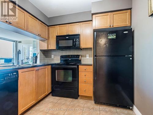 354 - 25 Viking Lane, Toronto (Islington-City Centre West), ON - Indoor Photo Showing Kitchen