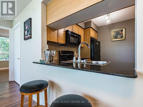 354 - 25 Viking Lane, Toronto (Islington-City Centre West), ON - Indoor Photo Showing Kitchen With Double Sink