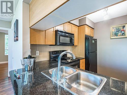 354 - 25 Viking Lane, Toronto (Islington-City Centre West), ON - Indoor Photo Showing Kitchen With Double Sink