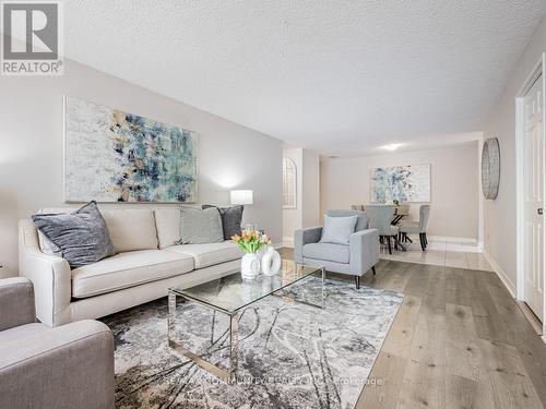 103 - 10 Tapscott Road, Toronto (Malvern), ON - Indoor Photo Showing Living Room