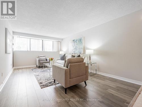 103 - 10 Tapscott Road, Toronto (Malvern), ON - Indoor Photo Showing Living Room