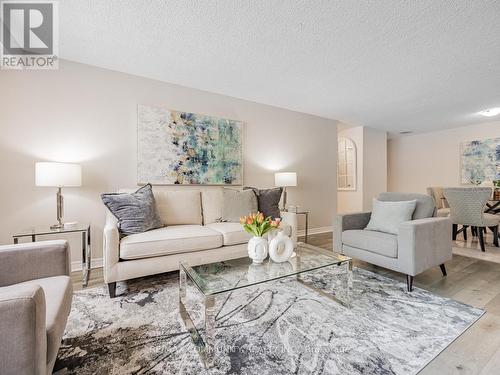 103 - 10 Tapscott Road, Toronto (Malvern), ON - Indoor Photo Showing Living Room