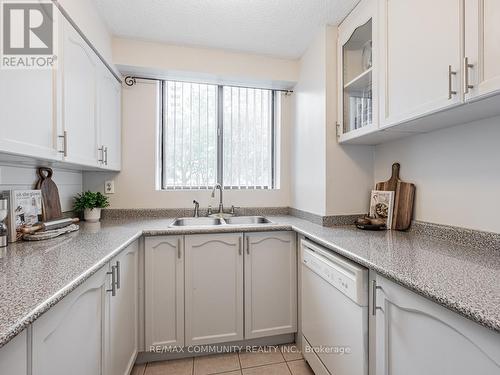 103 - 10 Tapscott Road, Toronto (Malvern), ON - Indoor Photo Showing Kitchen With Double Sink