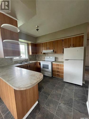 610 Albert Street, Hudson Bay, SK - Indoor Photo Showing Kitchen With Double Sink