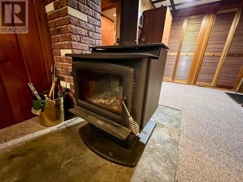 1525 3A Highway, Thrums, BC - Indoor With Fireplace