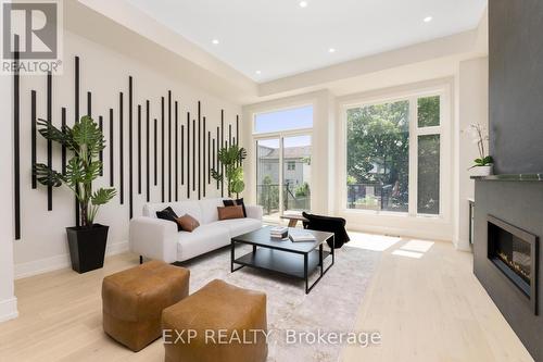 39A Evans Avenue, Toronto (Mimico), ON - Indoor Photo Showing Living Room With Fireplace