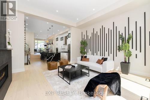 39A Evans Avenue, Toronto (Mimico), ON - Indoor Photo Showing Living Room With Fireplace