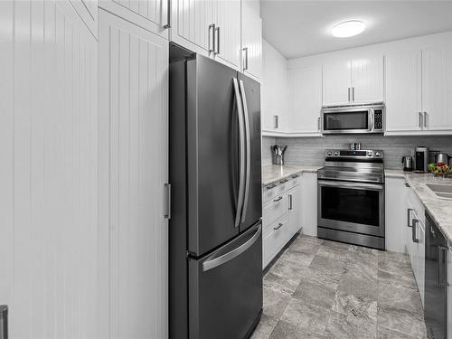 418-50 Songhees Rd, Victoria, BC - Indoor Photo Showing Kitchen With Stainless Steel Kitchen