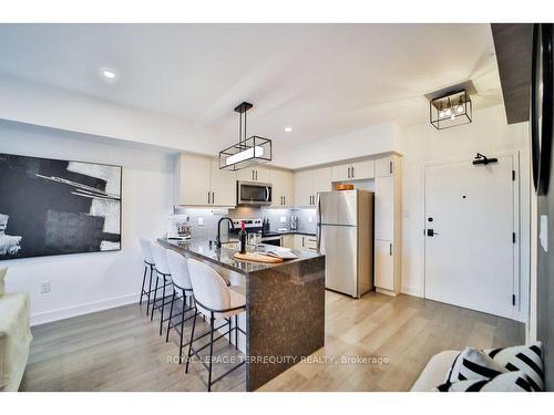 607-4 Spice Way, Barrie, ON - Indoor Photo Showing Kitchen