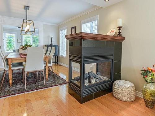 Dining room - 700 Boul. De Palerme, La Prairie, QC - Indoor Photo Showing Dining Room With Fireplace