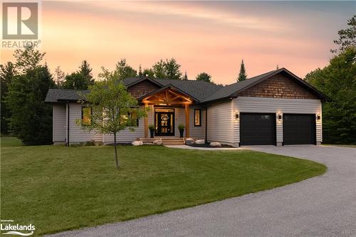 450 Fowlers Road, Huntsville, ON - Outdoor With Facade