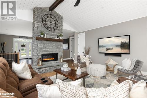 450 Fowlers Road, Huntsville, ON - Indoor Photo Showing Living Room With Fireplace