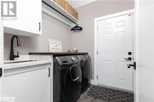 main level laundry - 450 Fowlers Road, Huntsville, ON - Indoor Photo Showing Laundry Room