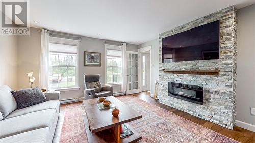 30 Satellite Road, Pouch Cove, NL - Indoor Photo Showing Living Room With Fireplace