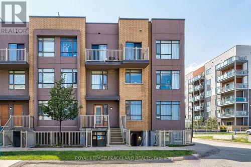 210 - 80 Orchid Place Drive E, Toronto (Malvern), ON - Outdoor With Facade