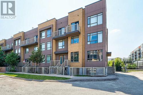 210 - 80 Orchid Place Drive E, Toronto (Malvern), ON - Outdoor With Facade