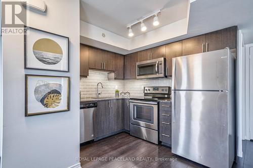 210 - 80 Orchid Place Drive E, Toronto (Malvern), ON - Indoor Photo Showing Kitchen With Stainless Steel Kitchen