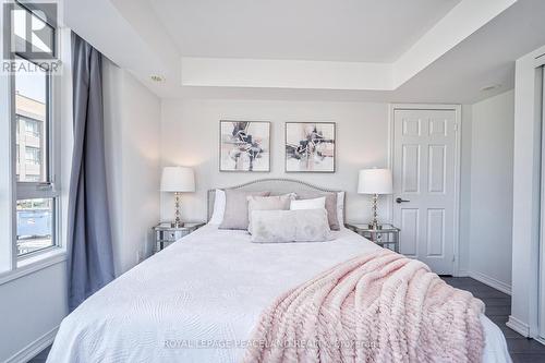 210 - 80 Orchid Place Drive E, Toronto (Malvern), ON - Indoor Photo Showing Bedroom