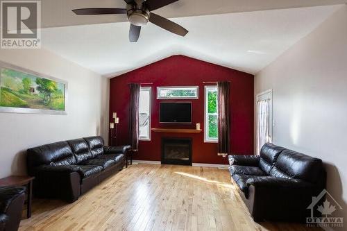 173 Streamside Crescent, Ottawa, ON - Indoor Photo Showing Living Room With Fireplace