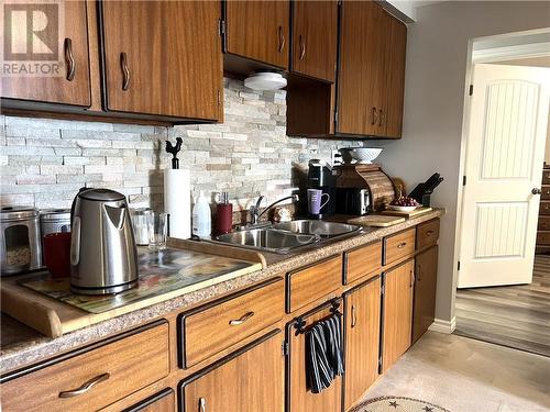 21 First Street, Plaster Rock, NB - Indoor Photo Showing Kitchen With Double Sink