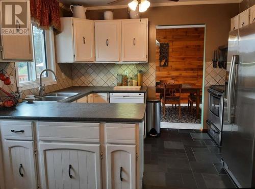 1323 7Th Avenue, Valemount, BC - Indoor Photo Showing Kitchen With Double Sink