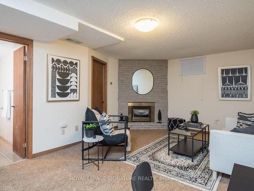 79 Ironstone Dr, Cambridge, ON - Indoor Photo Showing Living Room With Fireplace