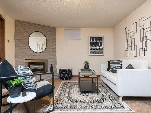 79 Ironstone Dr, Cambridge, ON - Indoor Photo Showing Living Room With Fireplace