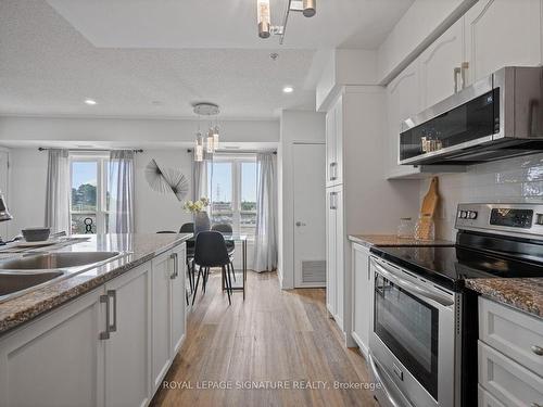 122-10 Mendelssohn St, Toronto, ON - Indoor Photo Showing Kitchen With Stainless Steel Kitchen With Double Sink With Upgraded Kitchen