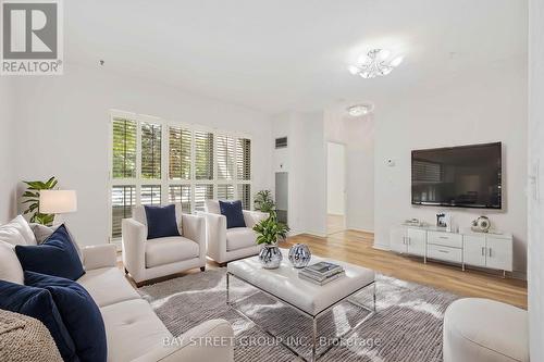 107 - 5039 Finch Avenue E, Toronto (Agincourt North), ON - Indoor Photo Showing Living Room