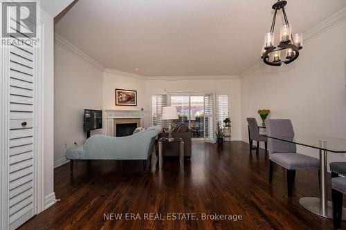 15 - 138 Waterside Drive, Mississauga (Port Credit), ON - Indoor Photo Showing Dining Room With Fireplace