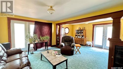 106 2Nd Street E, Dinsmore, SK - Indoor Photo Showing Living Room With Fireplace