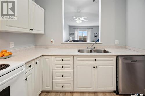 204 302 Nelson Road, Saskatoon, SK - Indoor Photo Showing Kitchen With Double Sink