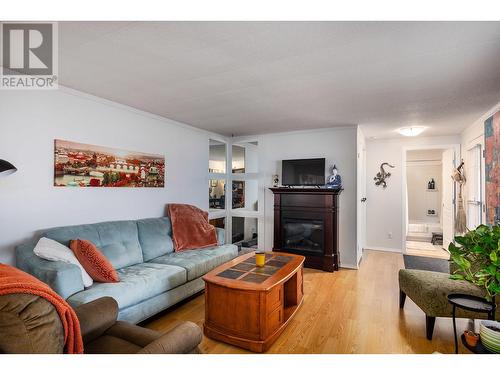 1929 Highway 97 South S Unit# 75, West Kelowna, BC - Indoor Photo Showing Living Room With Fireplace