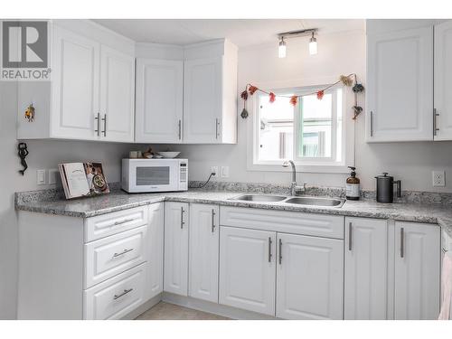 1929 Highway 97 South S Unit# 75, West Kelowna, BC - Indoor Photo Showing Kitchen With Double Sink