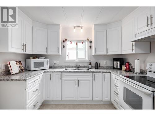 1929 Highway 97 South S Unit# 75, West Kelowna, BC - Indoor Photo Showing Kitchen With Double Sink