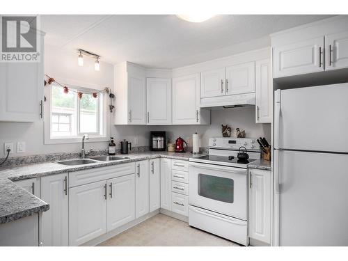 1929 Highway 97 South S Unit# 75, West Kelowna, BC - Indoor Photo Showing Kitchen With Double Sink