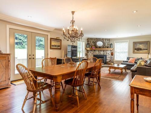 Dining room - 7 Rue Eldridge, Lac-Brome, QC - Indoor Photo Showing Dining Room With Fireplace